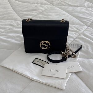 100% Authentic Gucci Black Crossbody Bag with Gold Accents